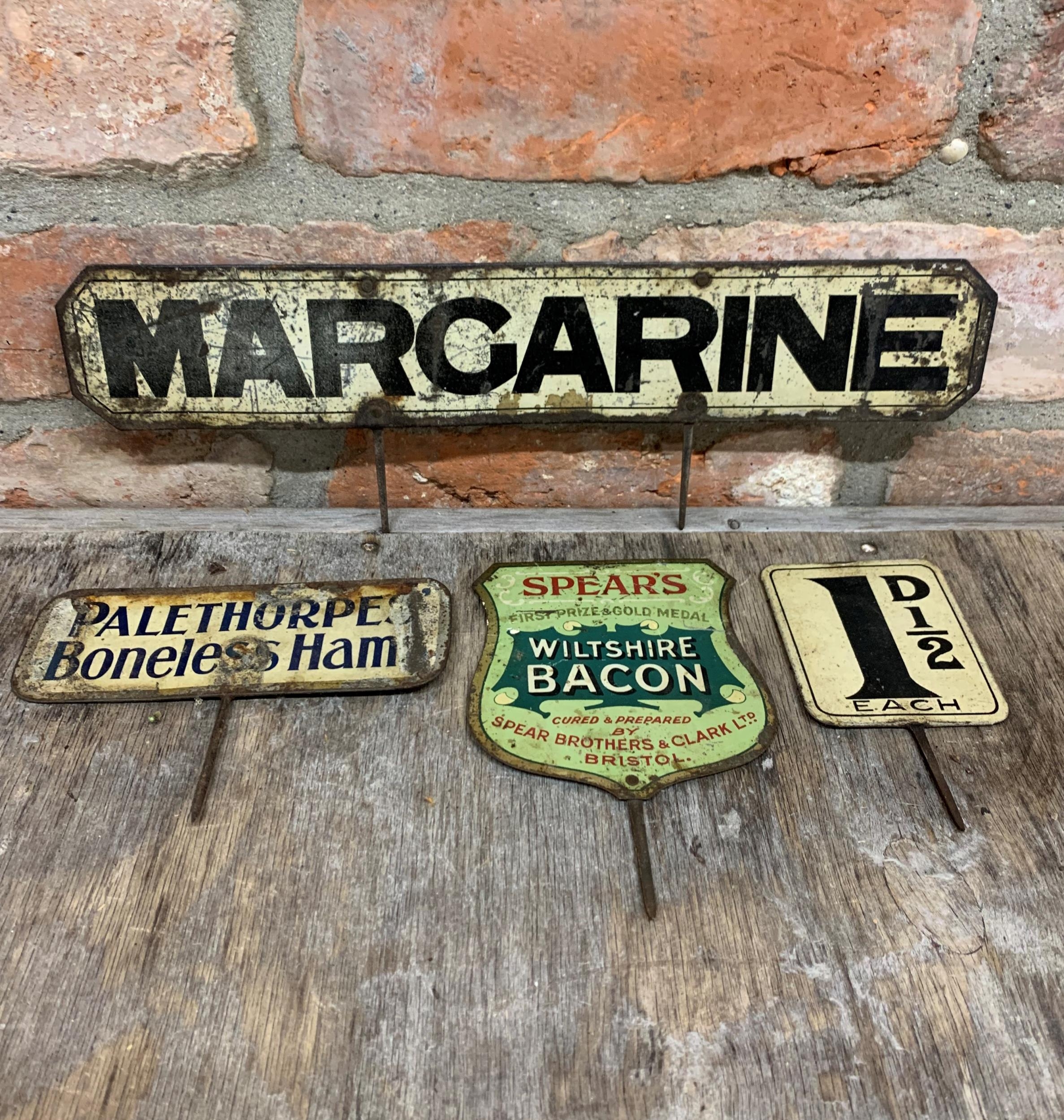 Quantity of antique store counter tin signs to include 'Spear's Wiltshire Bacon' and 'Palethorpe