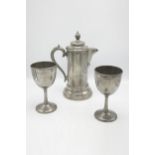 Thomas Otley & Sons of Sheffield - Communion pewter ewer and two wine vessels (3)