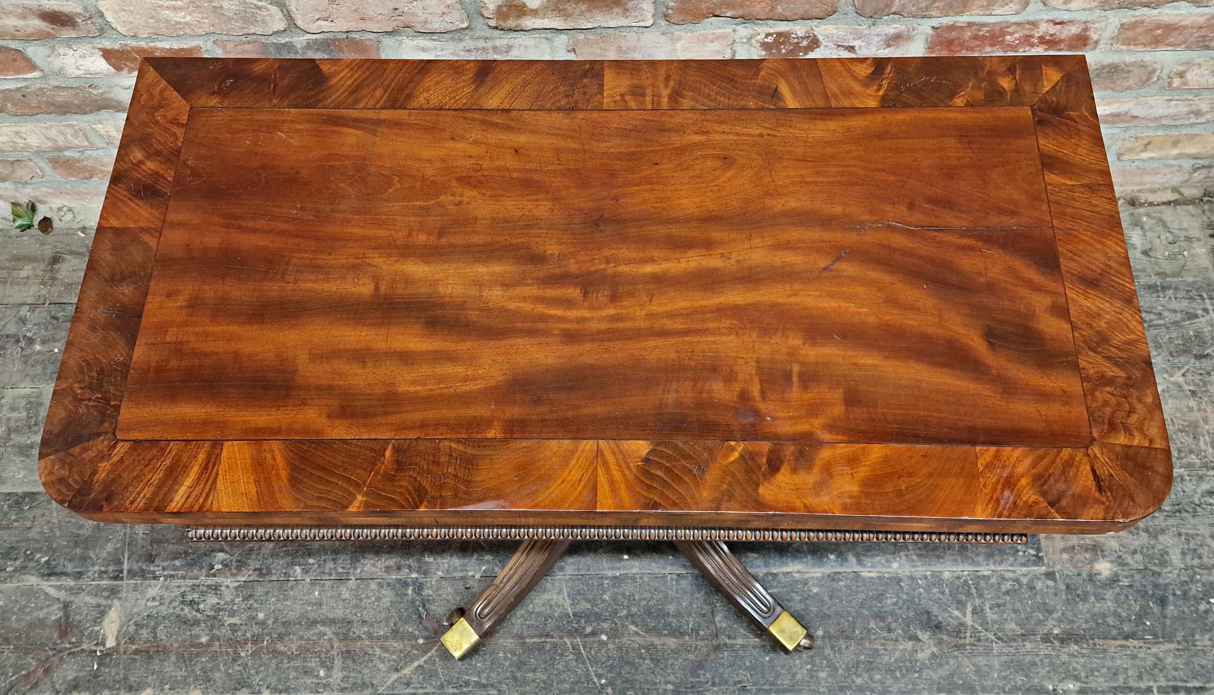 Regency mahogany fold over top card table, raised on a quadruped base with sabre supports on brass - Image 2 of 4