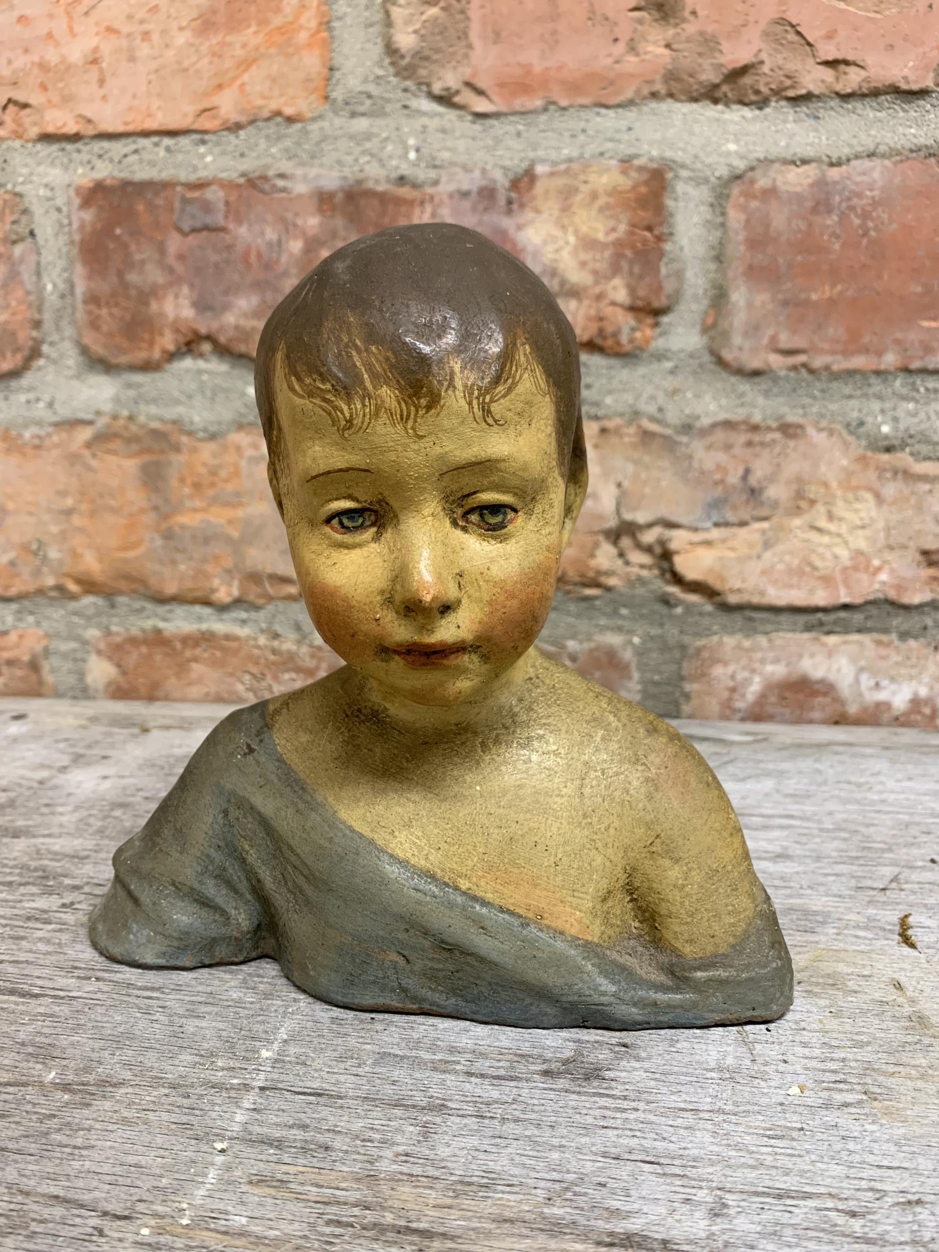 Early 20th century painted terracotta bust of a young boy, unsigned, 16cm high - Image 2 of 3