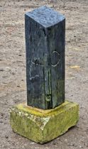 L . Office (Zimbabwe School) - A hardstone sculpture depicting a face raised on a stone base, H 58cm