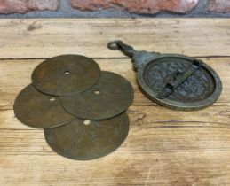 Antique Islamic brass astrolabe instrument, engraved throughout having pierced rete, four doubled