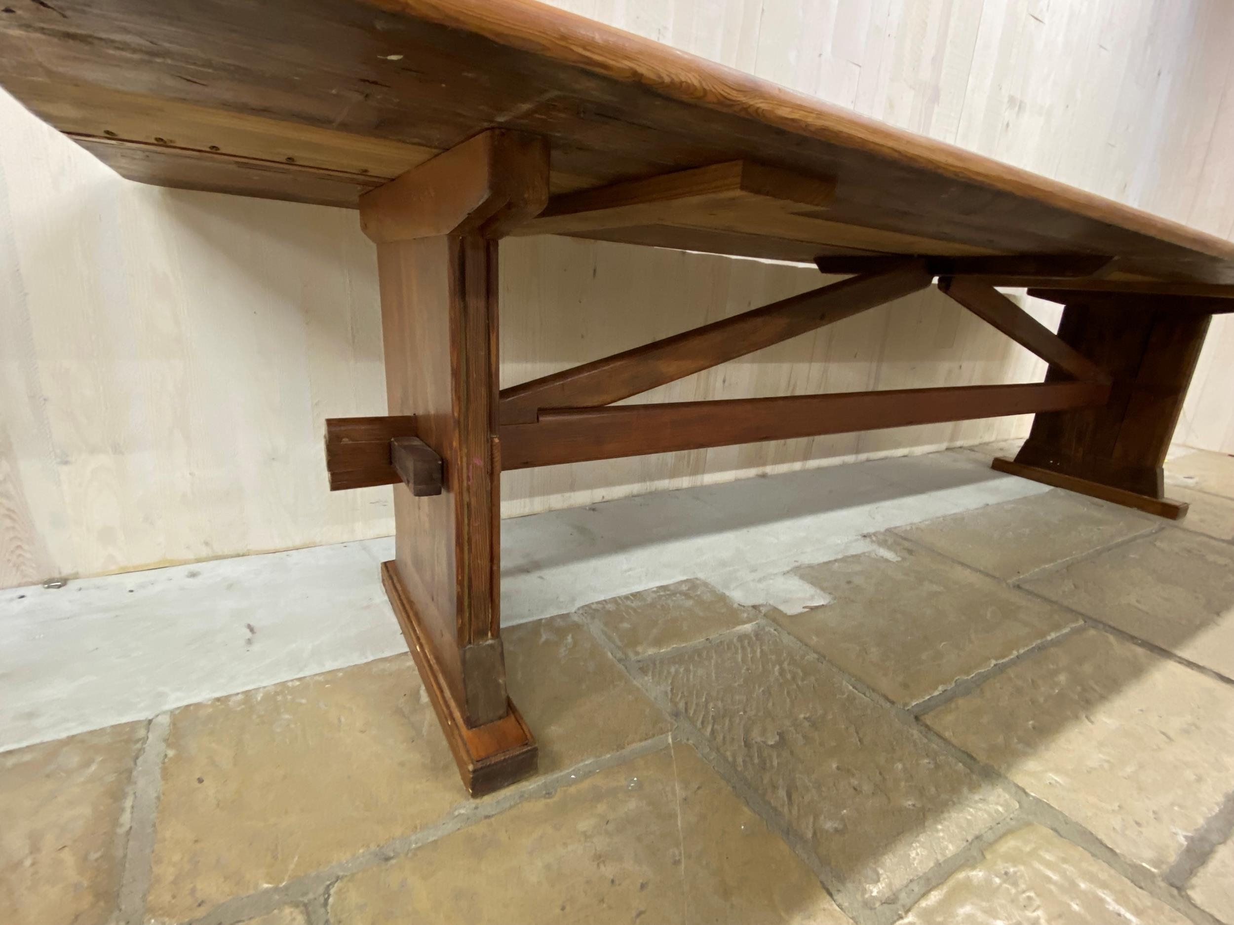 Good Arts and Crafts type pitch pine refectory table with arched stretcher, H 74cm x W 302cm x D - Image 4 of 8