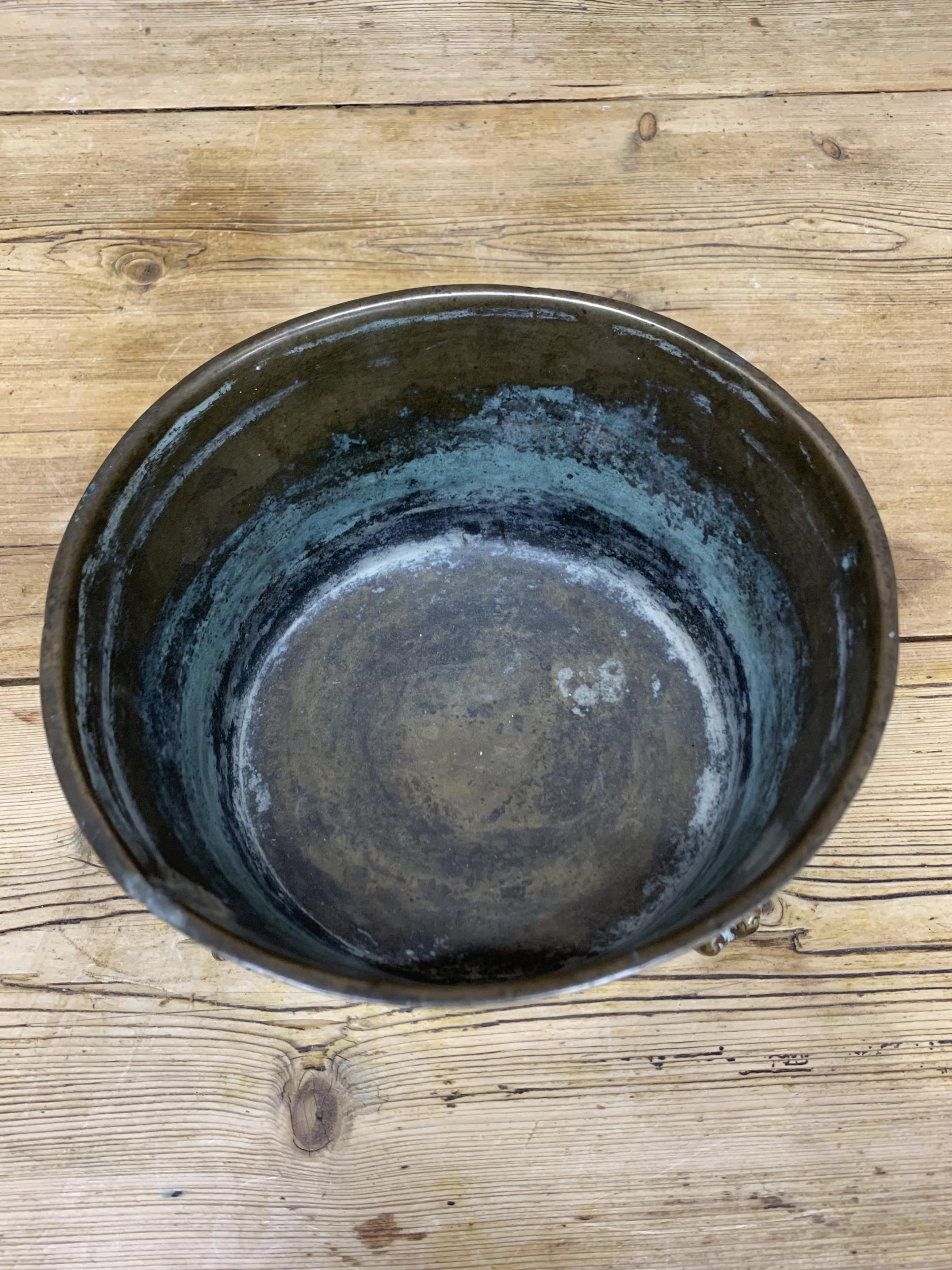 Antique brass bowl with three lion paw feet, H 13cm x D 20cm - Image 2 of 3