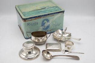Mixed silver comprising inkstand, Mappin & Webb leaf dish, cast bright cut sauce ladle, sugar