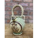 Antique 18th century Portuguese pottery water jug, cream ground and green banded finish, twist