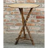 Victorian Aesthetic Movement bamboo octagonal side table raised on crossed tripod base, H 75cm x W