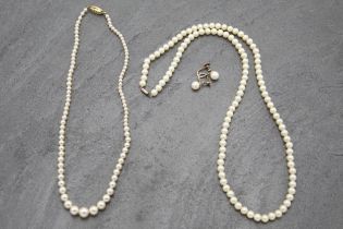 Pair of 9ct pearl earrings, with two pearl necklaces with 9ct clasps (3)