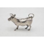 Good quality Victorian import silver novelty Cow Creamer, with hinged top mounted by a bluebell,