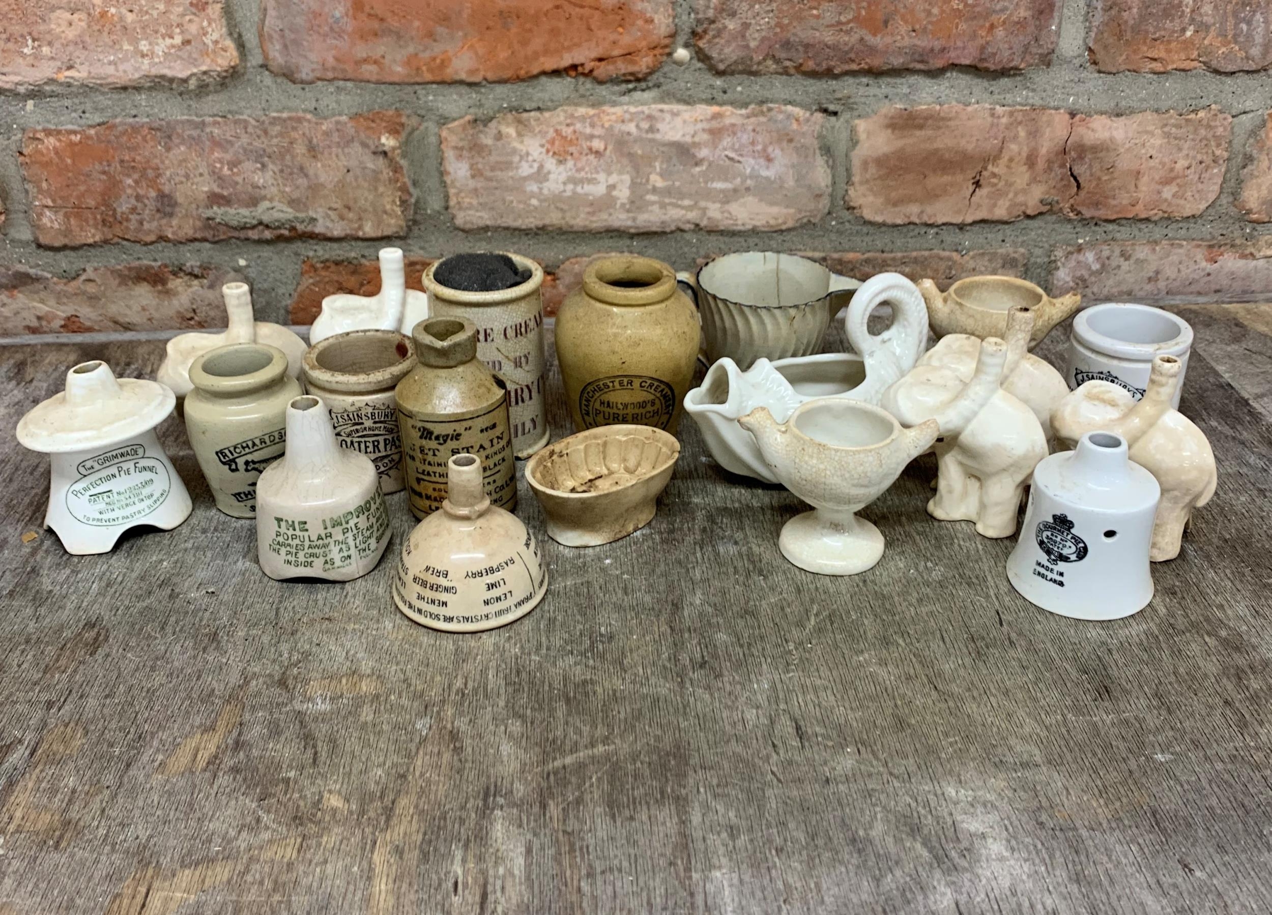 Quantity of mixed antique miniature creamware kitchen ceramics to include pie funnels, cups and jars