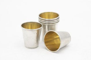 Set of six Russian silver Vodka tots with engraved decoration and gilt interiors, 4cm high, 3.5oz