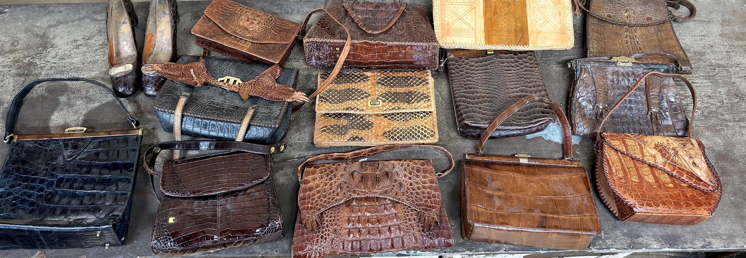 Assorted crocodile and alligator skin handbags to include examples with attached feet