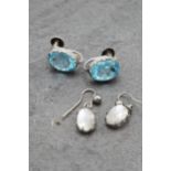 Pair of Victorian moonstone drop earrings with a further pair of Victorian blue zircon drop earrings