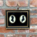 Victorian pen & ink husband and wife silhouettes with verre églomisé glass surround, inscription