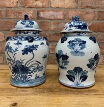 Matched pair of Chinese blue and white export porcelain lidded ginger jars, foo dog finial lid, H