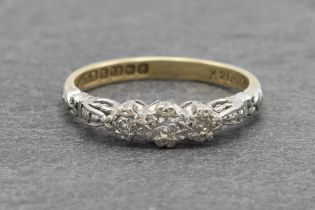 18ct diamond cluster ring, three stones in a fancy setting, size M, 3g