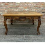 19th century French oak drawer leaf dining table, parquetry top on a good carved base with shell and
