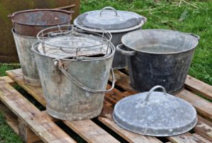 Collection of vintage galvanised buckets, tubs, and lids.