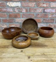 Five treen turned fruitwood bowls, the largest 31cm wide