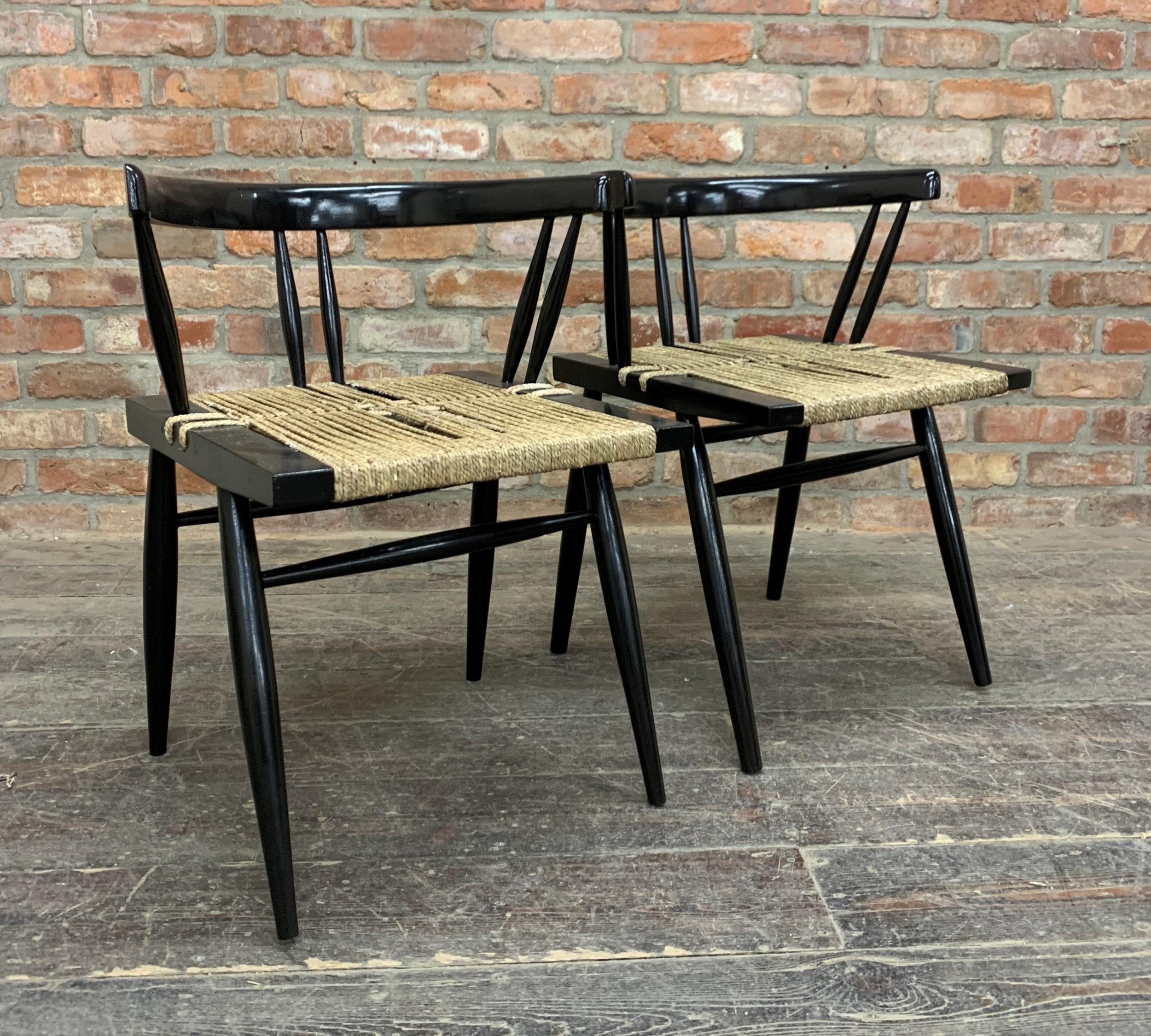 George Nakashima (1905-1990, American), "Ahmedabad" pair of chairs ebonised frames with woven