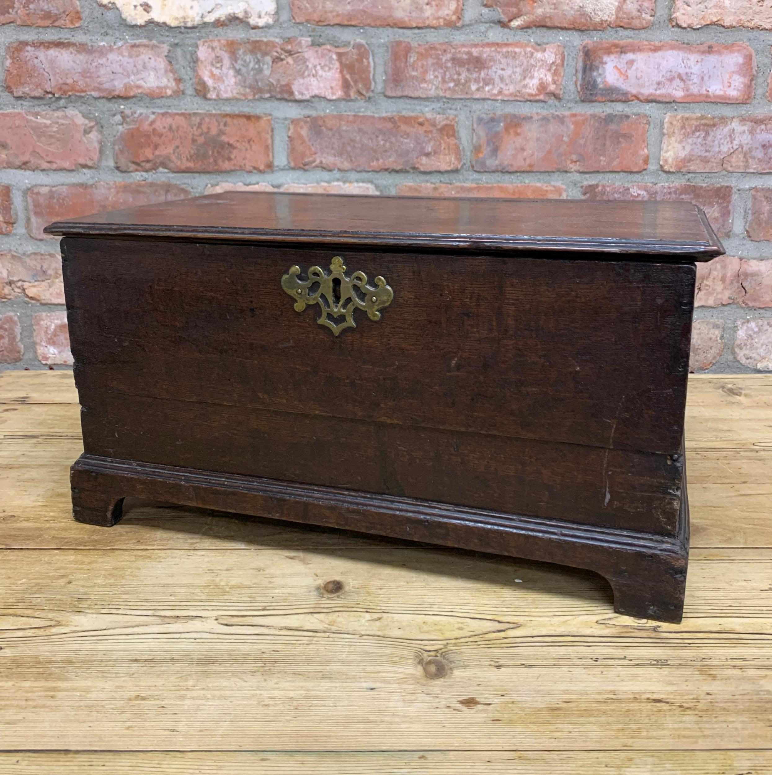 Early 19th century miniature oak coffer with hinged lid on bracket supports, H 26cm x W 51cm x D