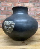 Unusual early 20th century basalt glazed twin mask handled baluster pottery vase, H 26cm x D 33cm