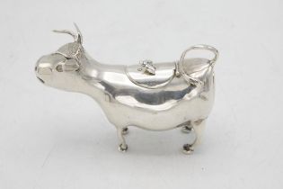Good quality Victorian import silver novelty Cow Creamer, with hinged top mounted by a bee, maker