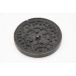Early Tang Dynasty Chinese bronze mirror, decorated with a scrolled animals and birds amongst