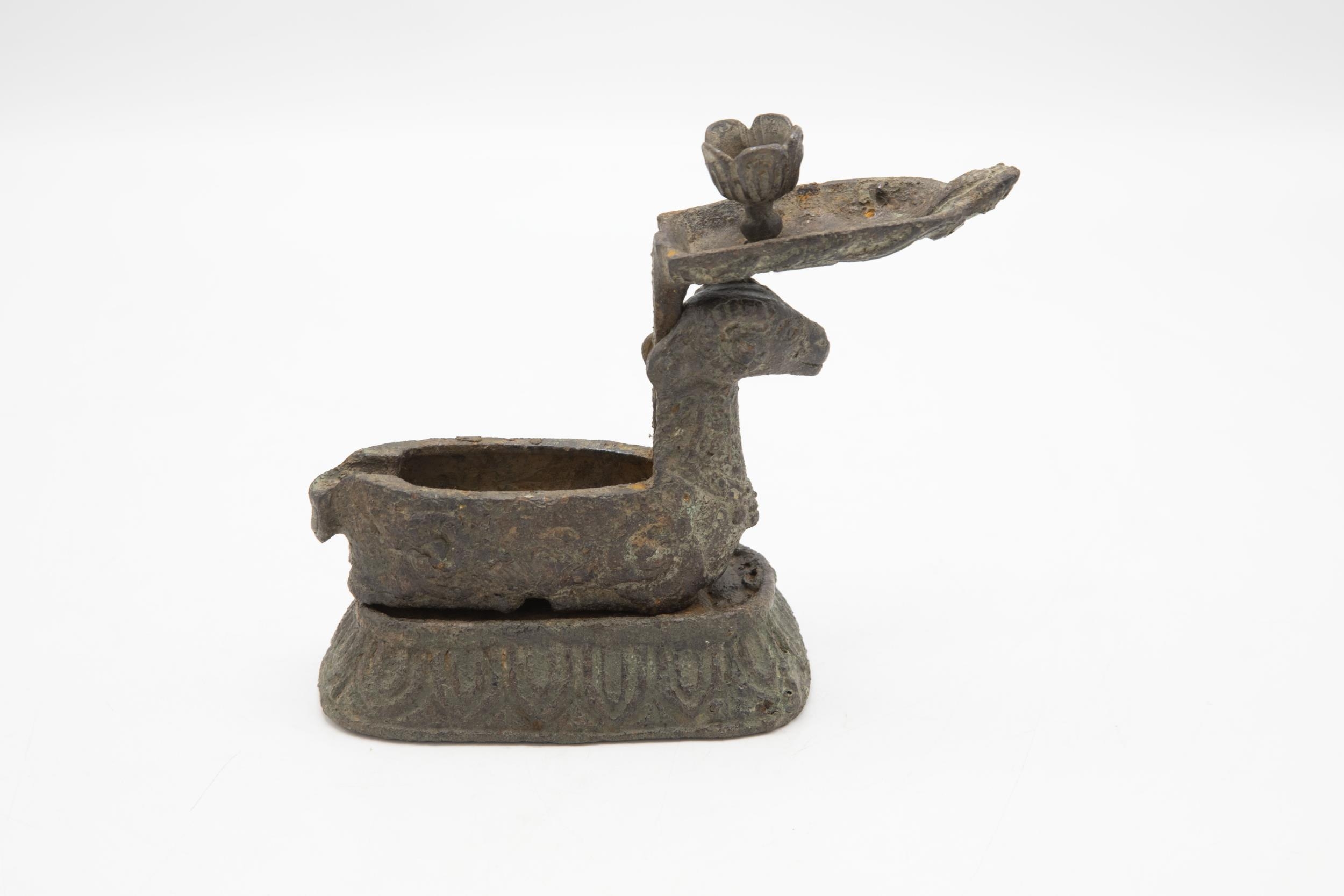 Impressive archaic Chinese influence cast iron lamp in the form of ram, possibly Roman