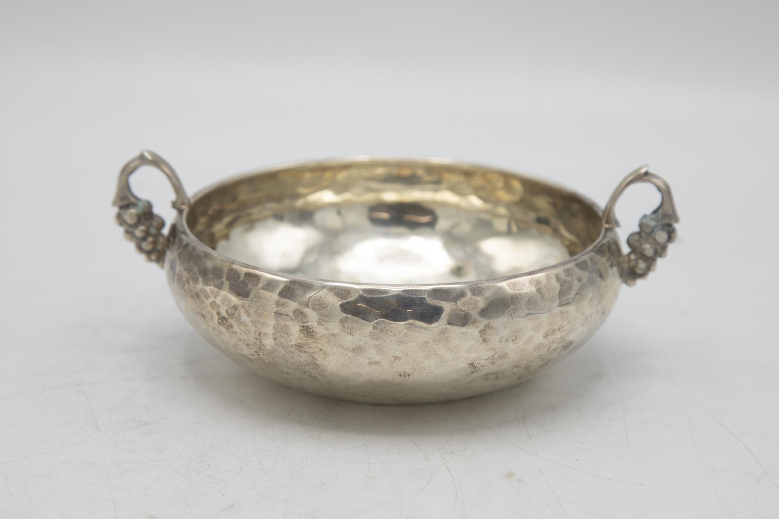 Unusual Greek 925 silver quaich or wine taster, with hammered bowl and grapevine handles, 15.5cm