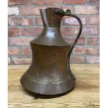 Large early Persian copper ewer with cast brass handle, 39cm high
