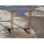 A pair of cast iron trestle table bases, H 76cm x W 78cm (2)