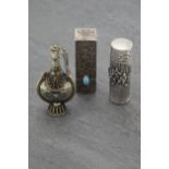 Good continental engine turned lipstick compact with turquoise cabochon button, 5.5cm long with a