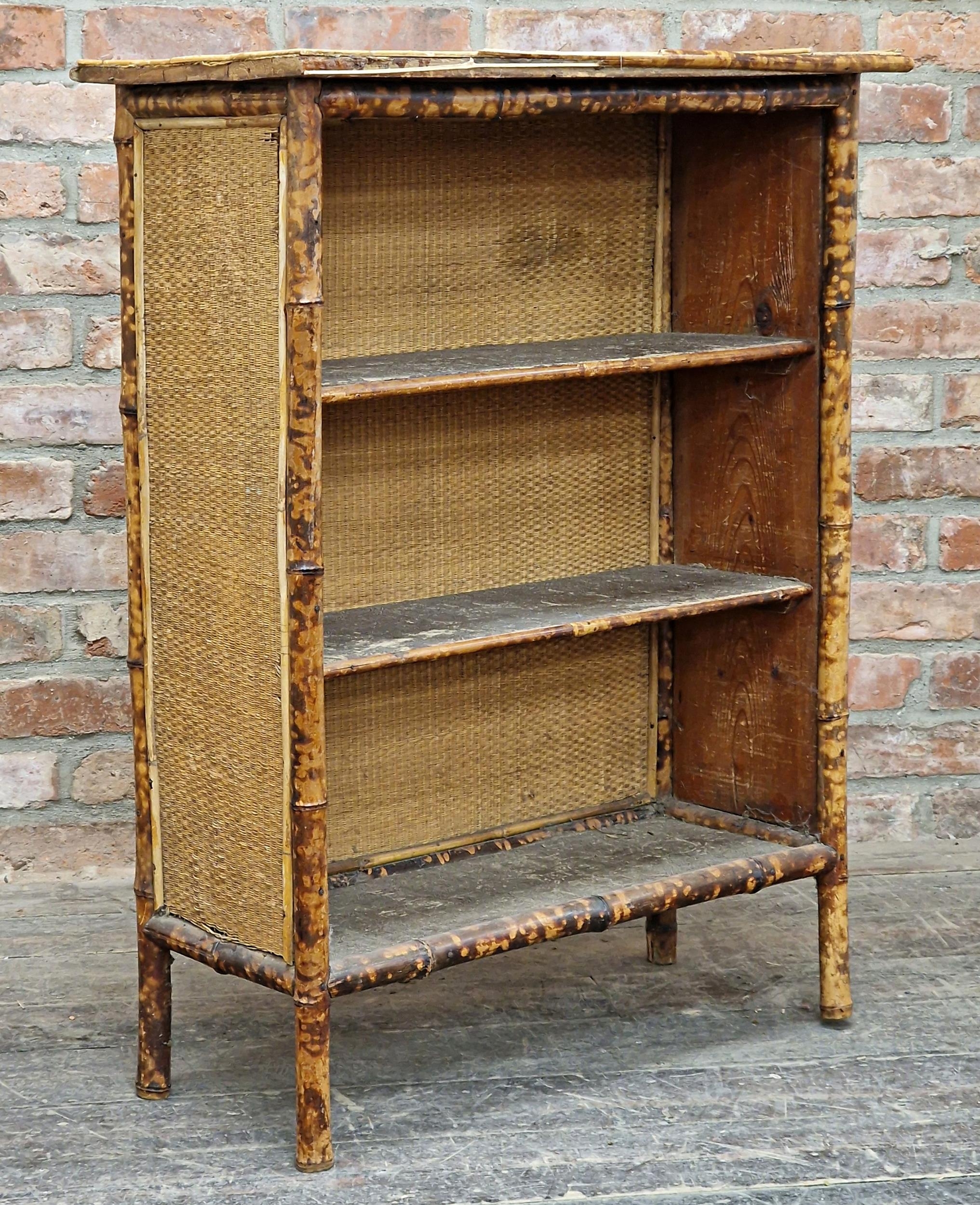 Victorian Aesthetic Movement bamboo and rattan open bookcase, the three fitted shelves with embossed - Image 4 of 5