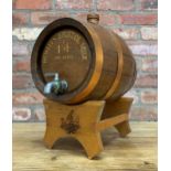 Hand painted wooden sherry barrel for 'Howells Bristol Milk Sherry', banded copper finish with