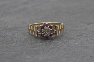 9ct diamond and pink sapphire ring, engine worked shoulders, size J, 1.8g