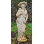 Weathered resin statue of a lady in a hat clutching a flower, H 125cm