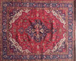 Superior North West Persian Heriz Country House carpet, traditional central blue medallion on red