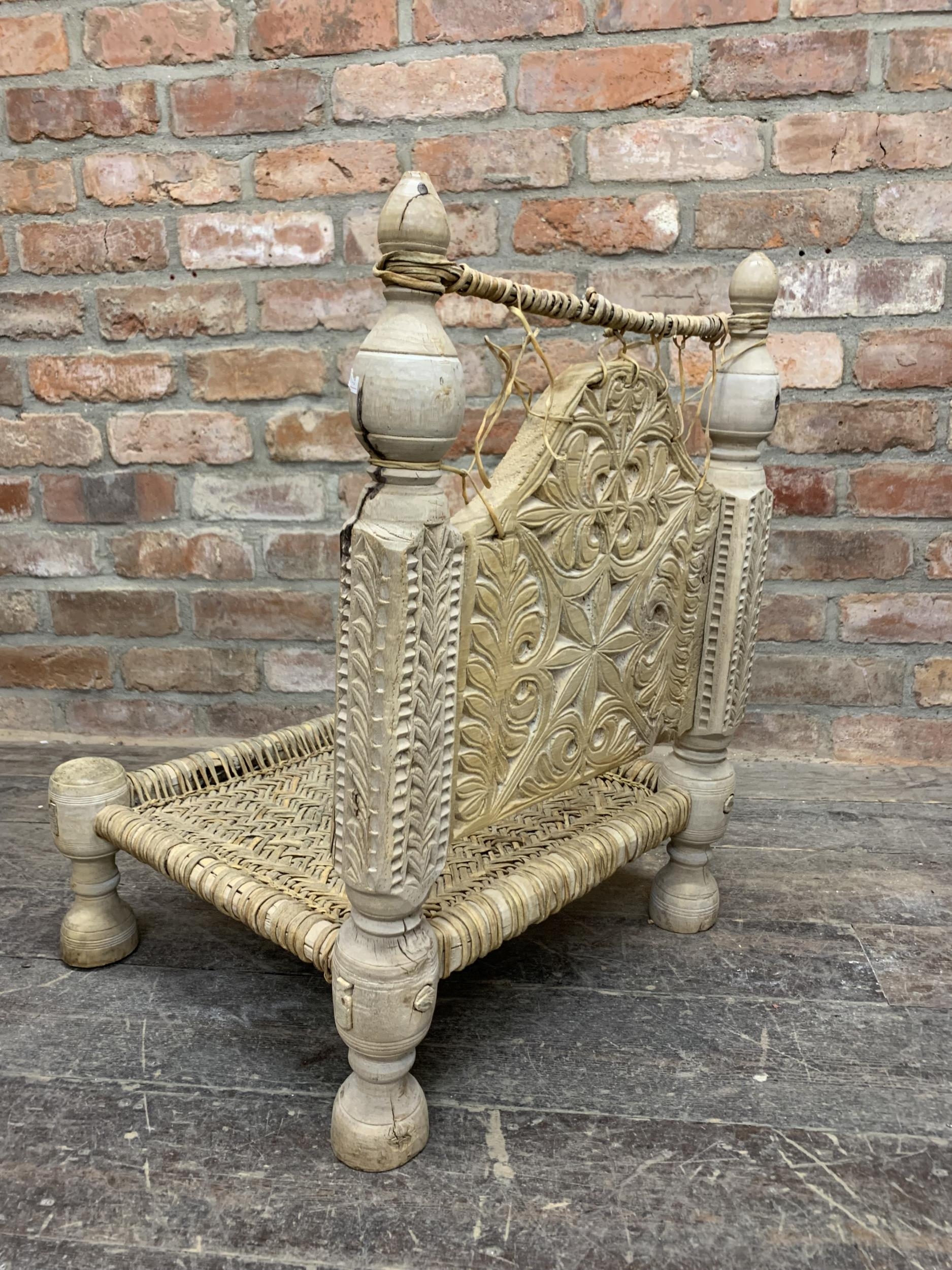 19th century Indian carved wood Pidha 'Marriage' chair, having carved back rest carved with - Image 3 of 3