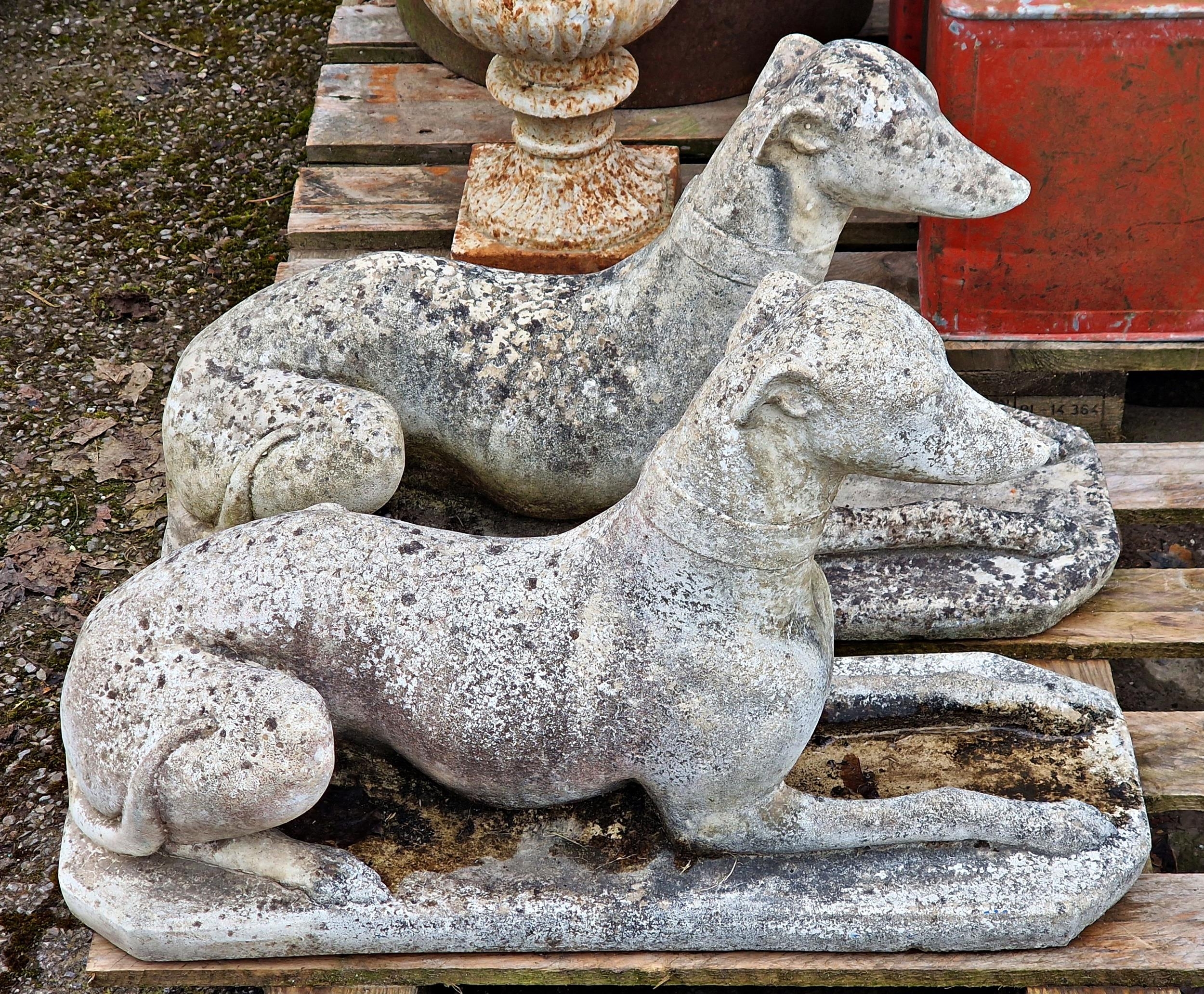 A pair of weathered reconstituted stone garden ornaments of recumbent greyhounds, H 38cm x W 69cm - Image 2 of 3