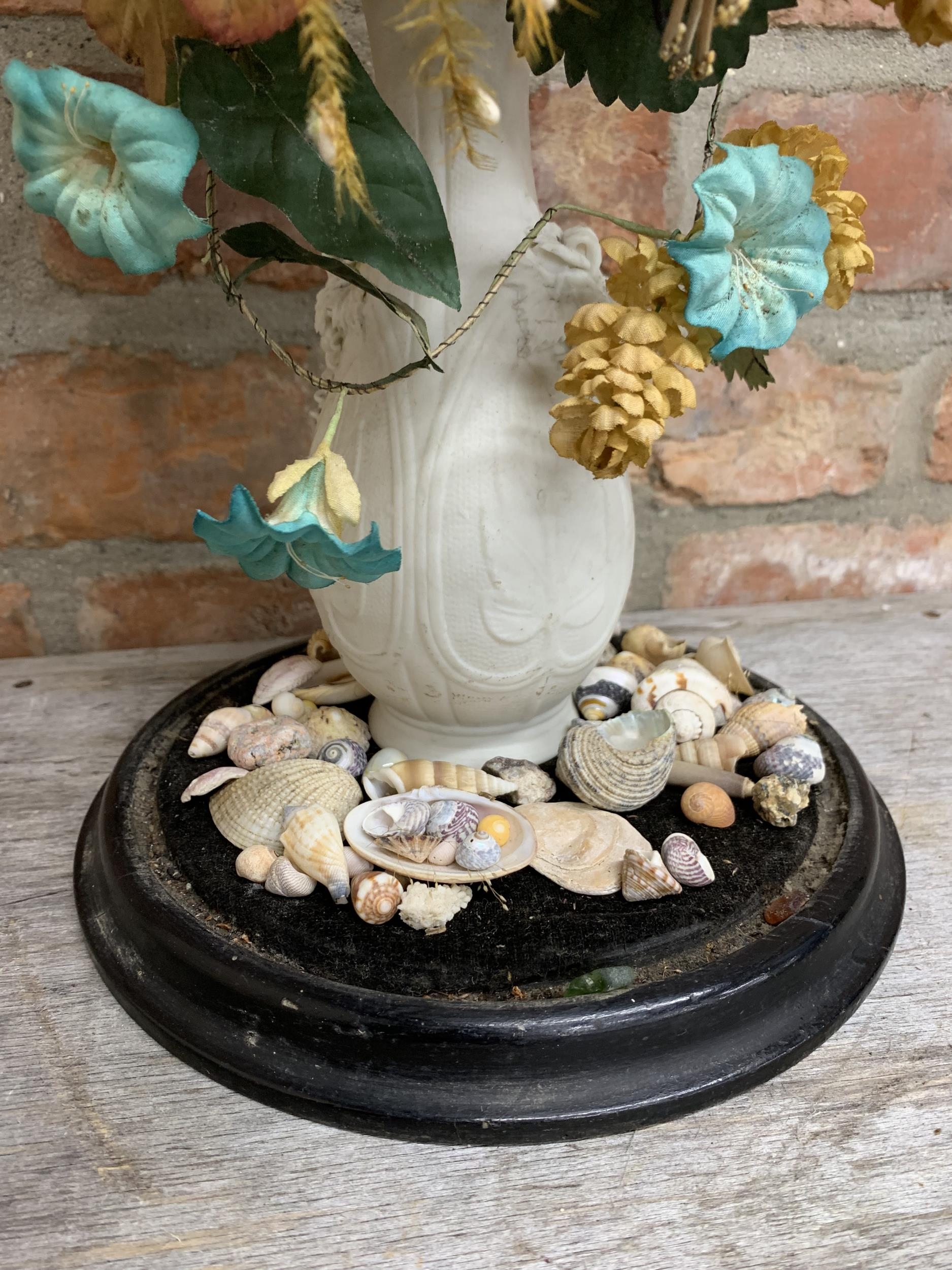 Victorian diorama of fabric flowers in a bisque baluster vase on a bed of shells, under a good - Image 3 of 4