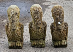 Three weathered reconstituted stone garden ornaments in the style of Wally birds, H 36cm (3)