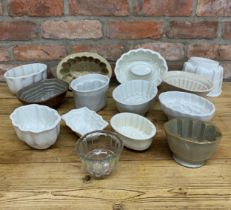 Assortment of antique jelly moulds to include ceramic, stoneware and glass examples (12)