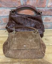 Carolina Herrera - a light brown suede shoulder bag and a brown leather handbag both embossed CH