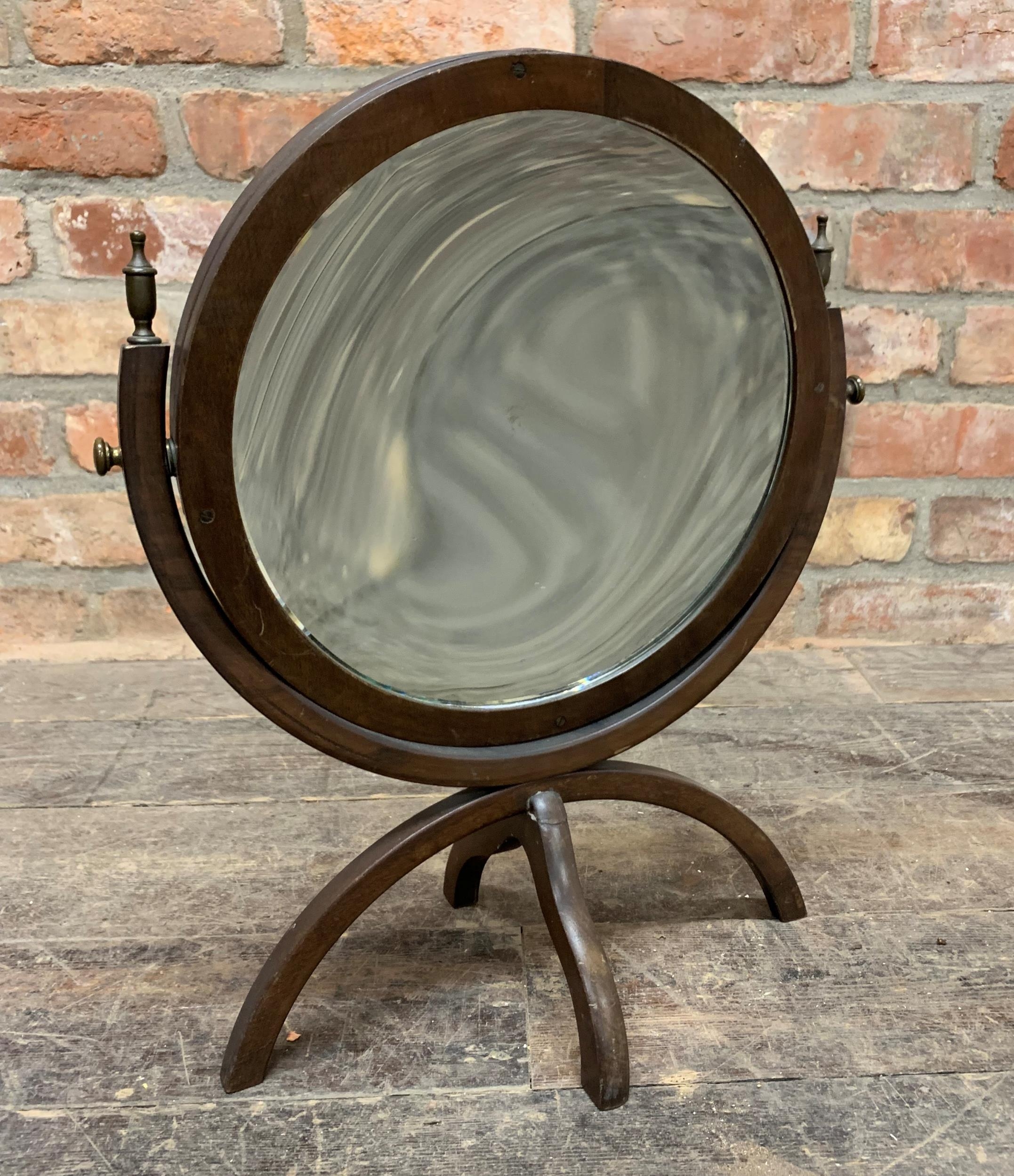 Regency mahogany twin sided toilet swing mirror with original bevelled glass upon an unusual