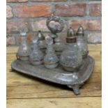 Antique silver plated seven bottle cruet and stand, 31cm wide