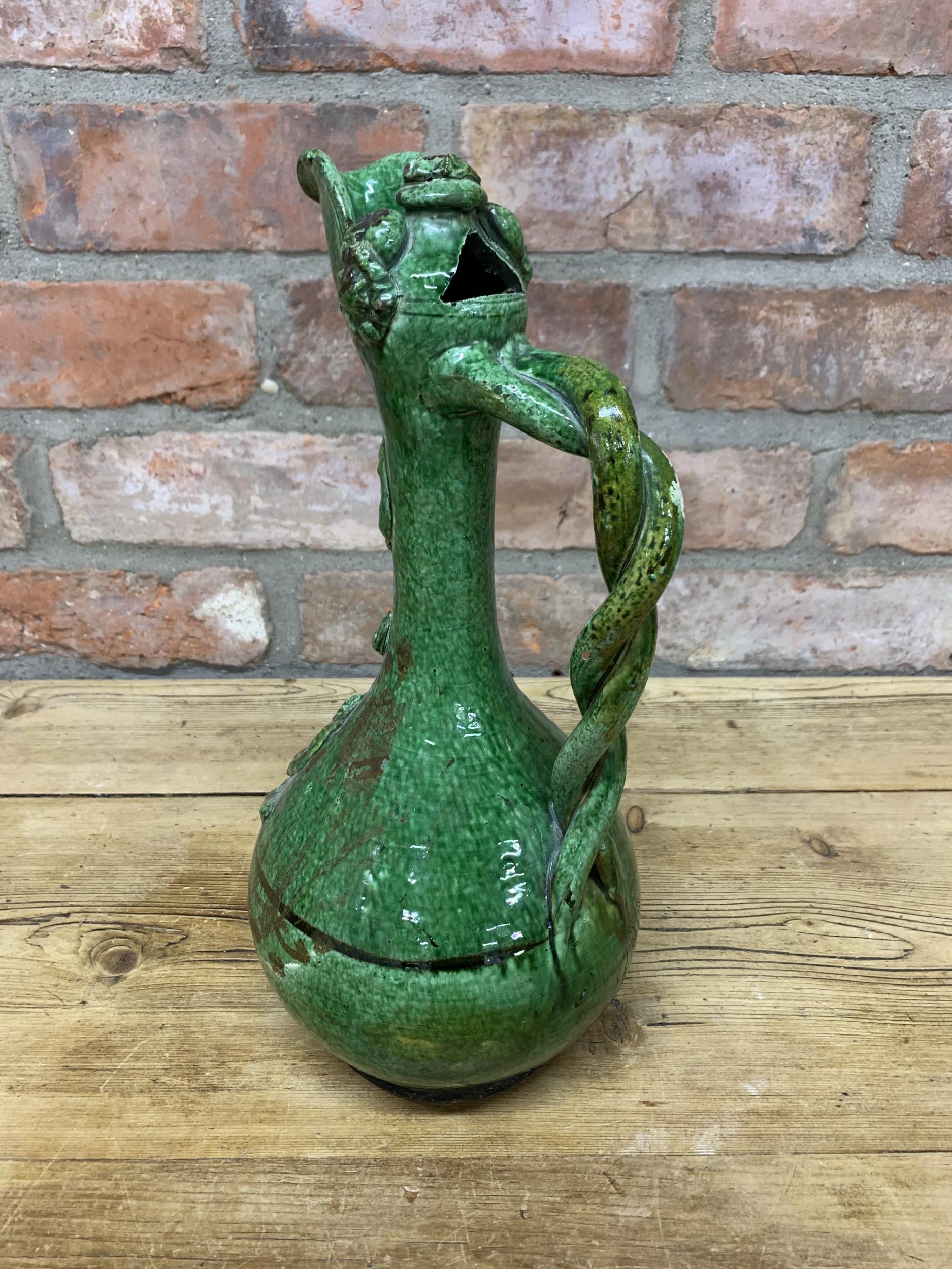 18th century Turkish Ottoman Canakkale pottery ewer with olive green glaze, bulbous body, long - Image 3 of 3