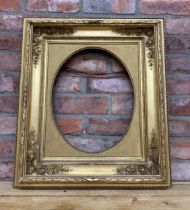 Antique wooden gilt frame with applied floral finish to corners, 67cm X 59cm