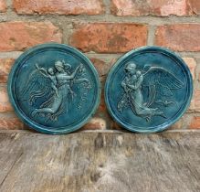 Pair of turquoise majolica wall plaques depicting angel & cherub scenes, D 25cm