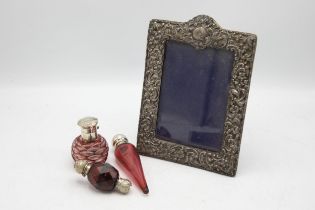 Victorian silver mounted cranberry glass teardrop scent bottle, 13cm long, with a further silver and